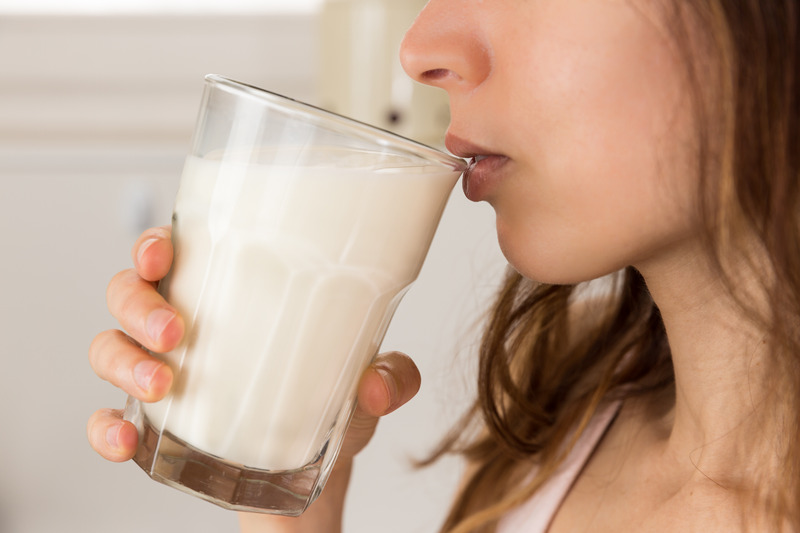 woman drinking cow's milk